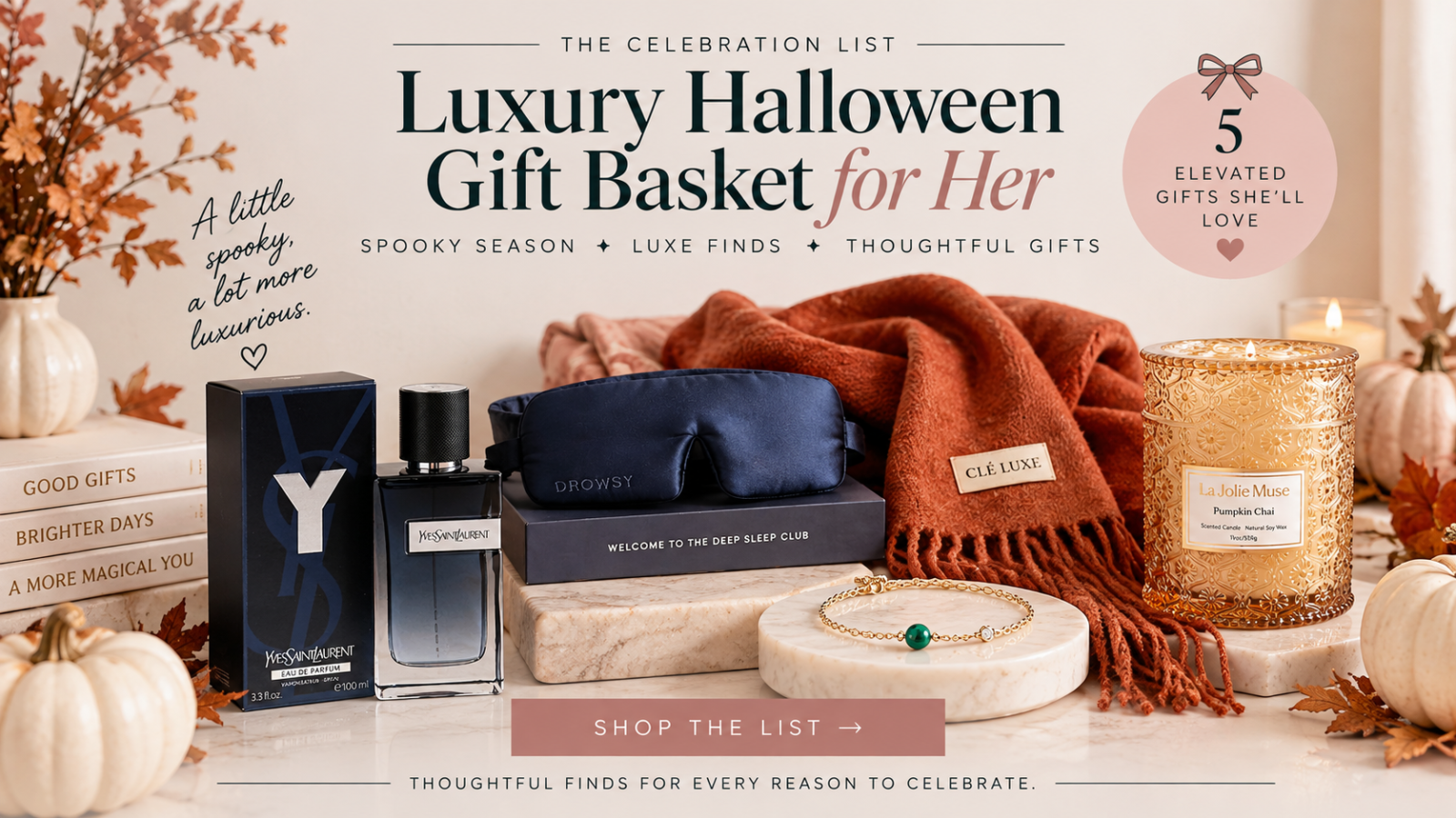 Luxury Halloween gift basket ideas for her featuring YSL Y Eau de Parfum, a DROWSY silk sleep mask, a Clé Luxe cashmere scarf, a MATEO New York malachite bracelet, and a LA JOLIE MUSE Pumpkin Chai candle.