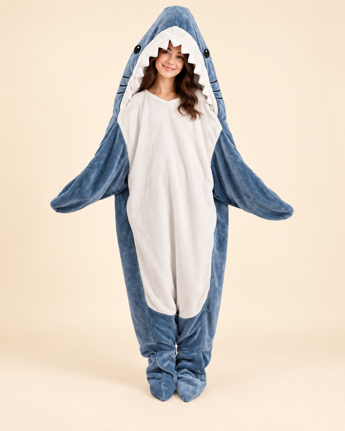 Adult wearing a blue-gray shark blanket hoodie costume