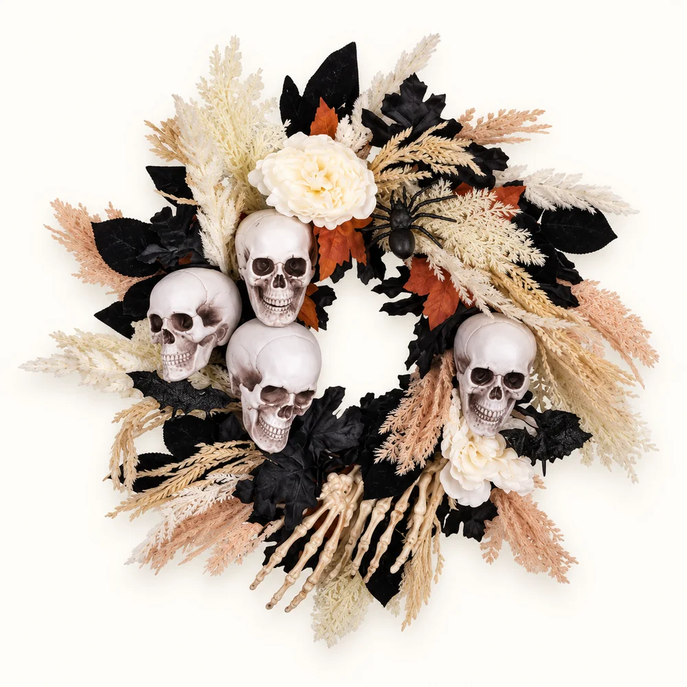 Neutral Halloween wreath with pale skulls cream flowers feathery stems and skeleton hands